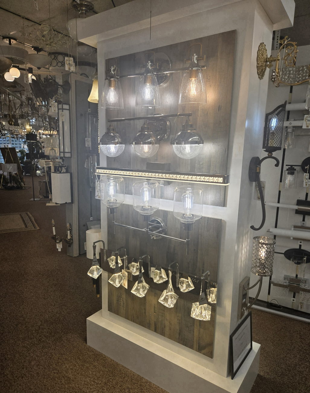Wall sconces and vanity lights on display at Wholesale Lighting Daytona